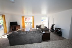 The living room of the fire test prop prior to the start of the overcharging experiment. The living room of the fire test prop prior to the start of the overcharging experiment.