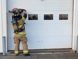 The second of the cuts that are made in the box tactic for a folding panel garage door. Note how the member has full control of the saw while operating above his head. The second of the cuts that are made in the box tactic for a folding panel garage door. Note how the member has full control of the saw while operating above his head.