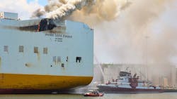 Fire continues to burn aboard the cargo ship Grande Costa D Avorio where two Newark firefighters were killed. Fire continues to burn aboard the cargo ship Grande Costa D Avorio where two Newark firefighters were killed.