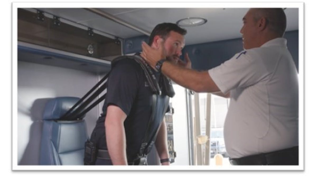 Cedric Palmisano, Deputy Chief of Special Ops &amp; Logistics for New Orleans EMS, demonstrates MBrace&trade; to a paramedic.