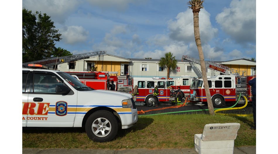 Photo 2: A common box alarm response to an apartment building fire (four engines, two trucks, one squad, EMS and two chiefs). It&rsquo;s critical that all apparatus be positioned for the maximum potential of an incident and where later-arriving apparatus will position based on required assessments.