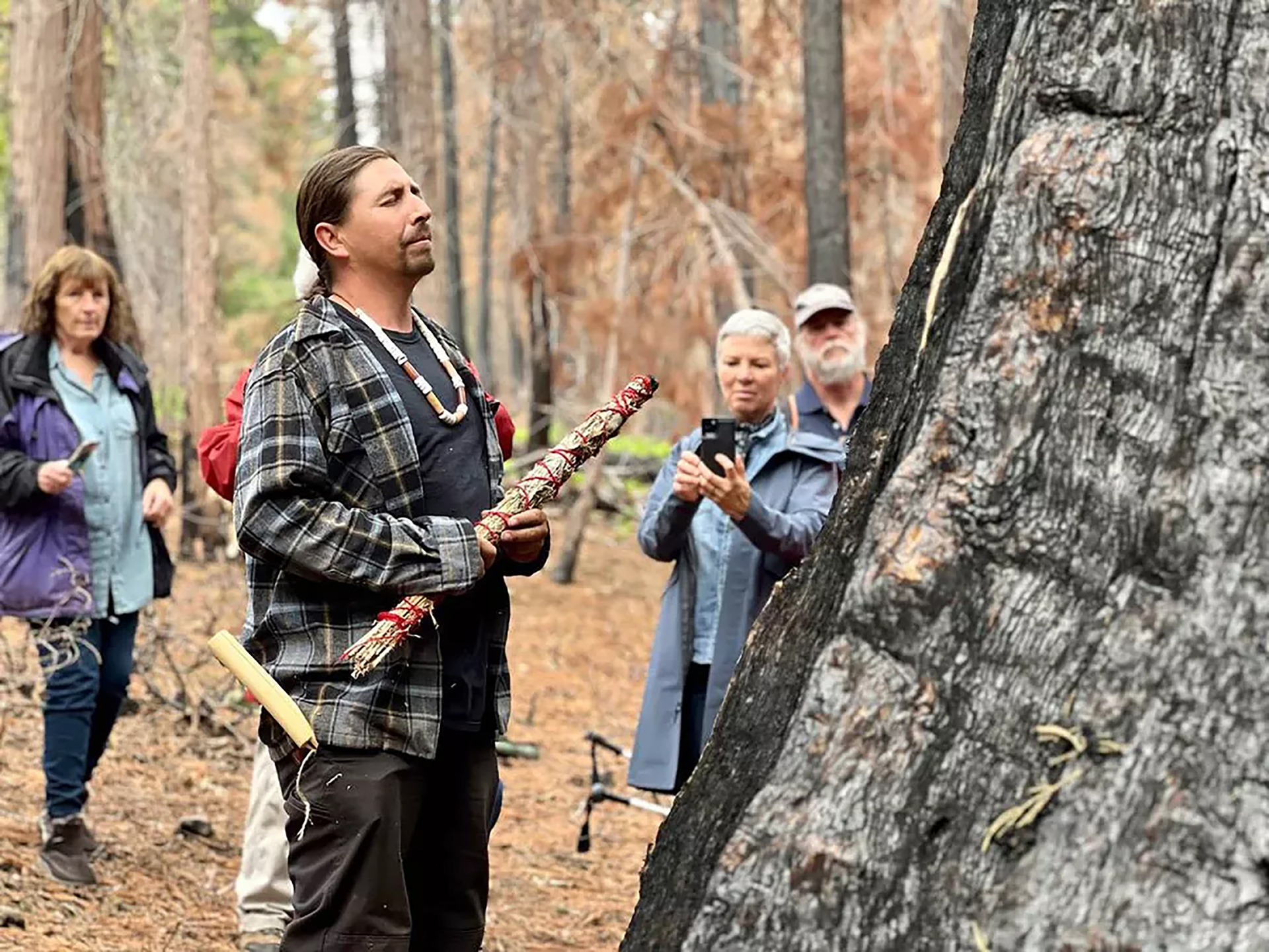 Leader of the Calaveras band of Mi-Wuk Indians Adam Lewis sang Native songs and prayed for &ldquo;the Orphans&rdquo; at Calaveras Big Trees State Park in June.