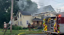 Syracuse firefighters tackle house fire.