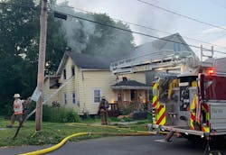 Syracuse firefighters tackle house fire. Syracuse firefighters tackle house fire.