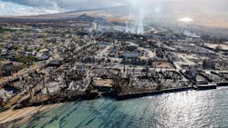 Days after the wildfire spread through Lahaina, buildings still smolder. Days after the wildfire spread through Lahaina, buildings still smolder.
