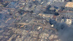 An overhead view of a fire still burning in Maui on Aug. 10, following the devastating wildfire.