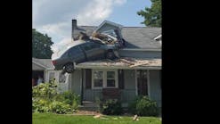 The car veered off the road, crossed a pasture field, hit an embankment and went airborne, landing on the porch roof of a Decatur Township home.