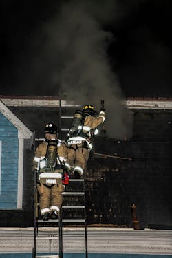 When crews have multiple roof ladders, they can utilize a vertical coffin cut to ventilate a steep roof. The last of the series of cuts permits the roof membrane to be louvered. Here, however, because the farthest most cut extends past a second rafter, the roof membrane can&rsquo;t be louvered.