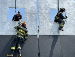 Students practice bail-out drills from this second-story window. Students practice bail-out drills from this second-story window.
