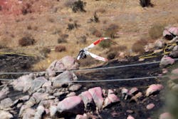 A mid-air collision claimed two firefighters and the pilot of one helicopter. A mid-air collision claimed two firefighters and the pilot of one helicopter.