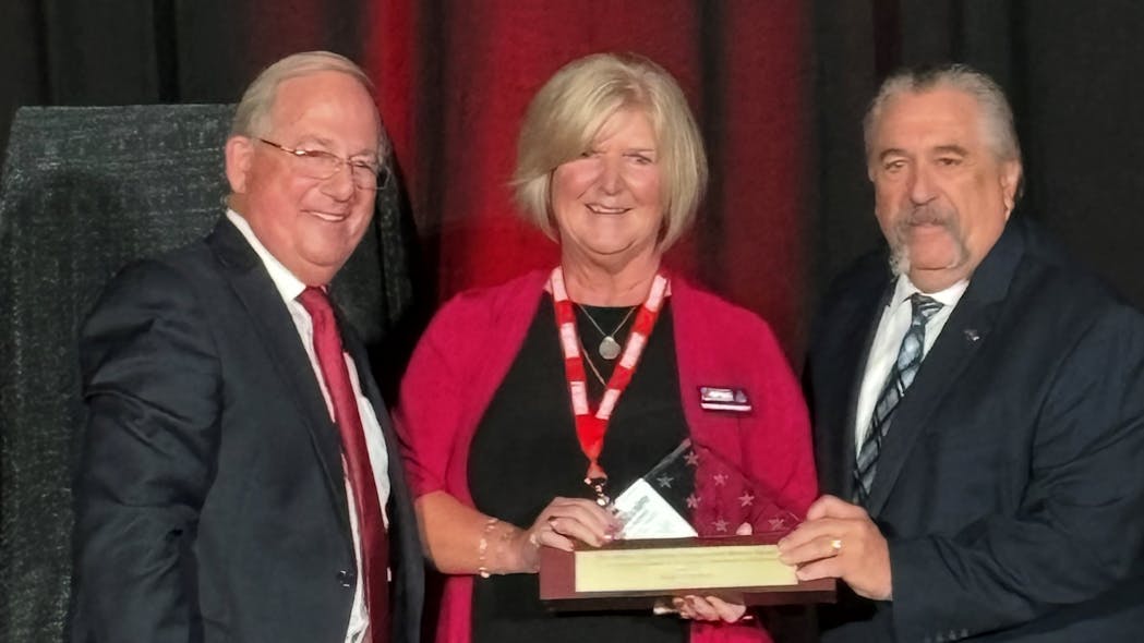 Tony Campisi, chairman of the Glatfelter Insurance Group, presented the NFFF&rsquo;s Arthur J. Glatfelter Distinguished Service Award to Vickie Pritchett, vice president/executive officer at the National Fire Sprinkler Association.