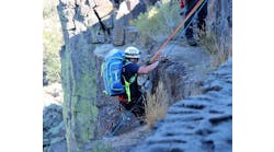 A Magic Valley Paramedics&rsquo; Special Operations Reach and Treat (SORT) team member is lowered over the side of the Snake River Canyon to begin to treat an injured hiker.