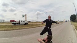 A police body cam captured Dallas Paramedic Brad Cox kicking and punching a homeless man. A police body cam captured Dallas Paramedic Brad Cox kicking and punching a homeless man.