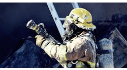 Firefighter Holding Water Hose 1374455