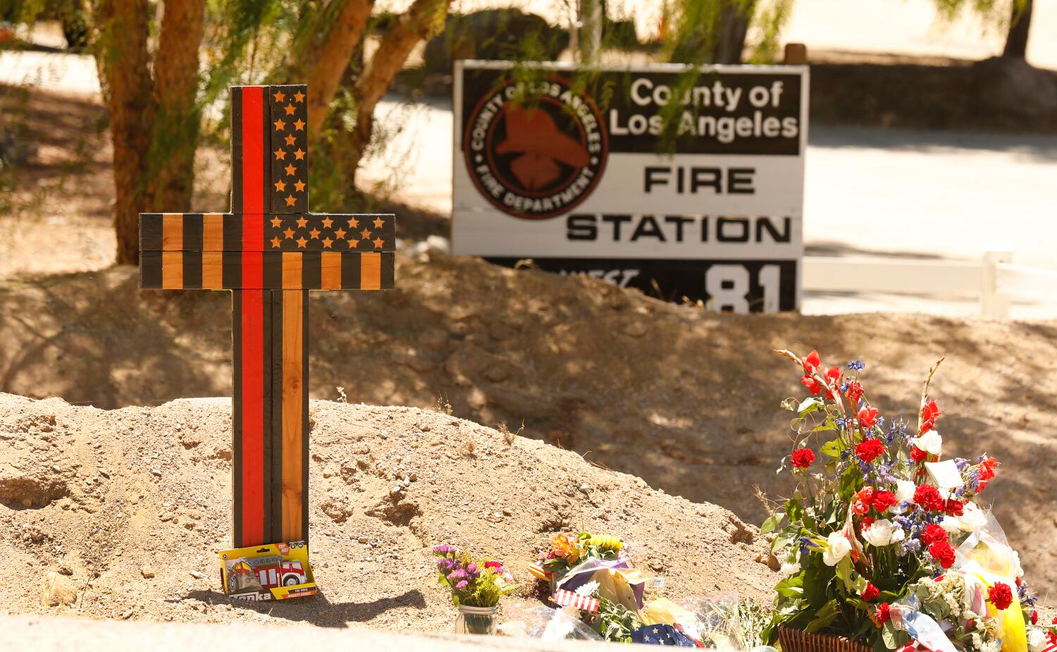 A memorial was placed outside Station 81 after the deadly shooting.