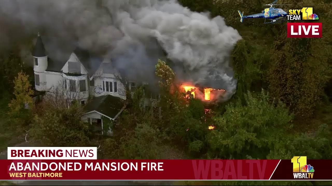 Baltimore firefighters are taking a defensive posture on an abandoned house fire.