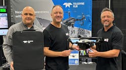 Firehouse Vice President/Publisher Bill MacRae (l.) and Teledyne Director Greg Nagler (c.) present the SIRAS to Joey Dockins, who accepted the award on behalf of winner Jerod Davenport. Firehouse Vice President/Publisher Bill MacRae (l.) and Teledyne Director Greg Nagler (c.) present the SIRAS to Joey Dockins, who accepted the award on behalf of winner Jerod Davenport.