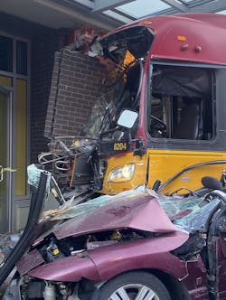 A pedestrian outside the Seattle building was killed and a car driver was rescued after a King County Metro bus crashed Saturday. A pedestrian outside the Seattle building was killed and a car driver was rescued after a King County Metro bus crashed Saturday.