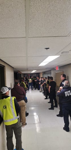 Participants receive a briefing during the four-phase training program held in Minnesota. Participants receive a briefing during the four-phase training program held in Minnesota.
