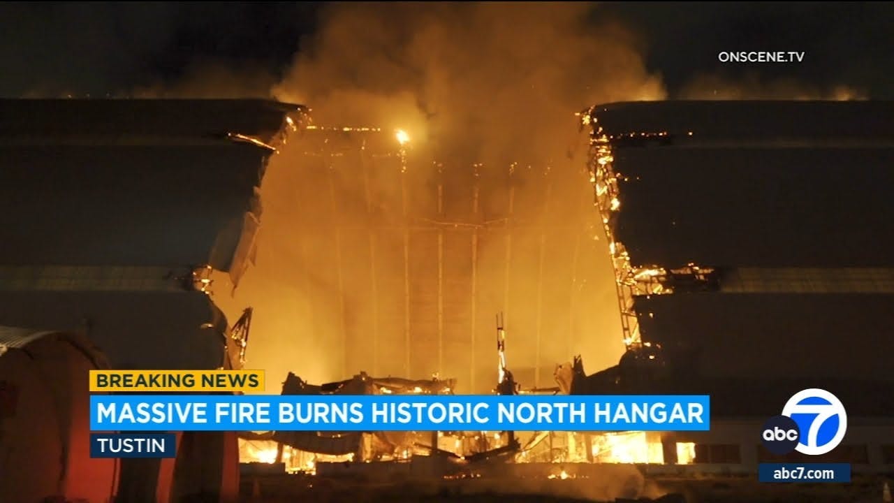 LIVE: Massive fire burns through historic hangar in Tustin