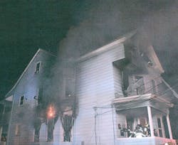 Paterson firefighters found a man hanging from the top floor window and rescued him over a ground ladder. Paterson firefighters found a man hanging from the top floor window and rescued him over a ground ladder.