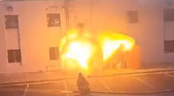 Fiery explosion erupts after firefighter opens door