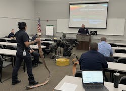 Good instructors create a learning environment that challenges students and causes them to think. Here, instructors relate the operation of a fire pump and hose to the working of the heart for EMS training.