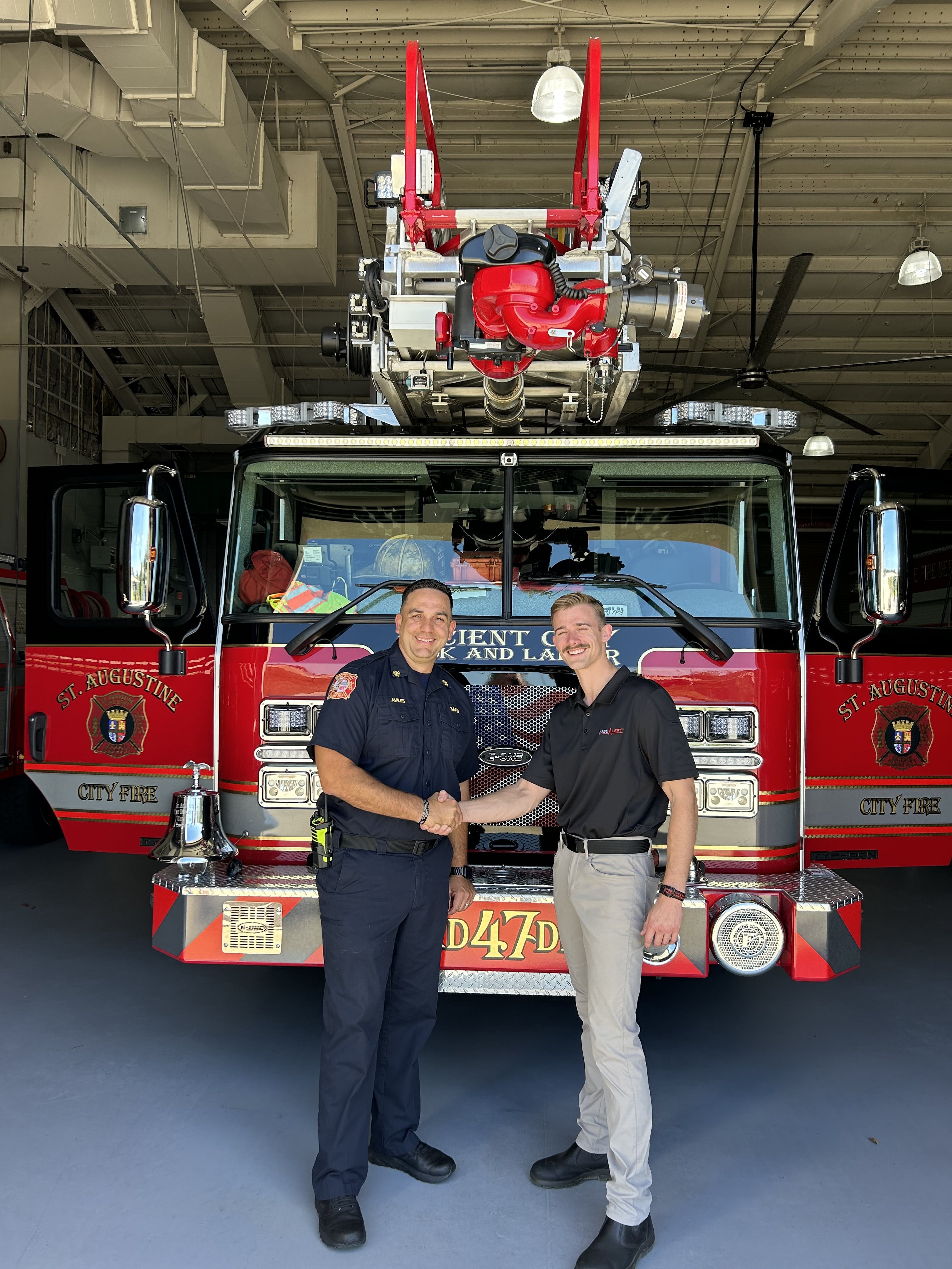 EaseAlert's Blake Richardson and St. Augustine Fire Department Chief Carlos Aviles