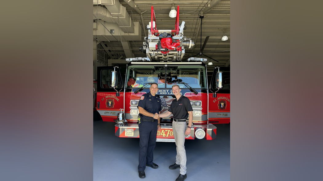 EaseAlert&apos;s Blake Richardson and St. Augustine Fire Department Chief Carlos Aviles