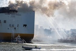 Crews continue to battle a fire on the Grande Costa D'Avorio in Port Newark a day after two Newark firefighters died in the fire. Crews continue to battle a fire on the Grande Costa D'Avorio in Port Newark a day after two Newark firefighters died in the fire.