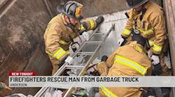 Anderson firefighters rescue person trapped in waste truck