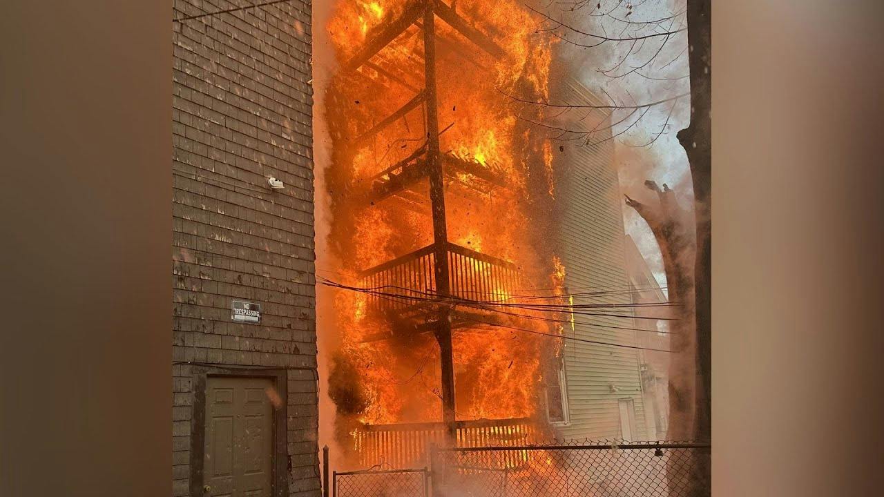 Fire destroys Boston triple-decker, damages nearby homes