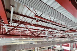Many apparatus bays have exposed steel joists, conduit, ductwork and piping, which create countless surfaces that can collect carcinogens and are challenging to keep clean.