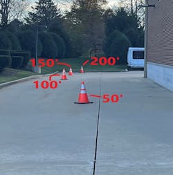 Without initially measuring, lay cones every 50 feet (or the length of hose that your department carries) from your engine to the end of your initial attack line.