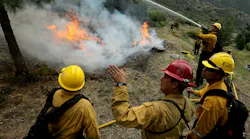U.S. Forest Service firefighters take part in a controlled burn in the Angeles National Forest last month.
