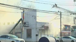Fire breaks out at auto shop in Manchester