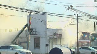 Fire breaks out at auto shop in Manchester