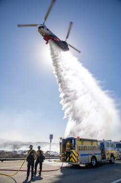 A Quick Reaction Force (QRF) Coulson helicopter that was under contract from Southern California Edison makes a drop on the Field Incident in Ventura County.