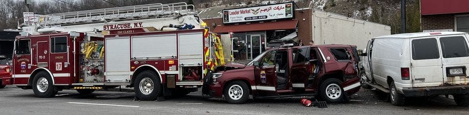 A white van crashed into the back of a Syracuse Fire SUV, which crashed into a pumper. An ambulance was also involved in the crash.