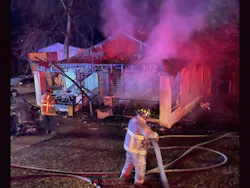 Birmingham firefighters rescued a man from this house fire. Birmingham firefighters rescued a man from this house fire.