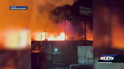 Massive fire in Portland neighborhood destroys building, scorches I-64 bridge