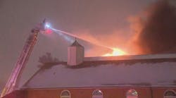 Firefighters battle blaze in 3-story building on South Side Firefighters battle blaze in 3-story building on South Side