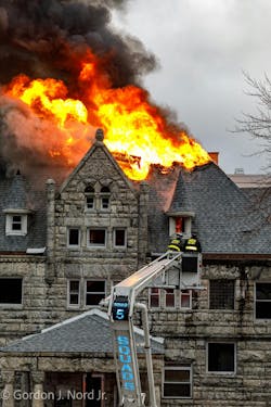 A tower ladder, a snorkel and numerous other streams were successful in keeping the fire at a three-story mansion (built in 1892) to the building of origin.