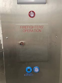 In some elevator cars, the in-car Stop switch is located behind a locked panel that requires a key to access. In some elevator cars, the in-car Stop switch is located behind a locked panel that requires a key to access.