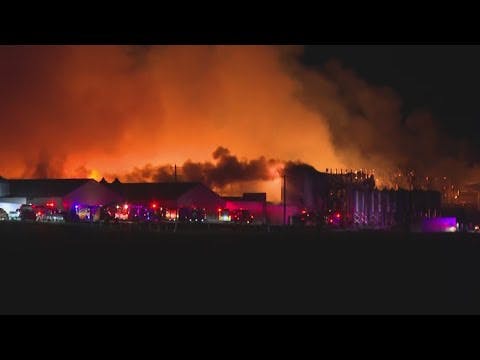 Large fire still burning at chicken farm in Brazos County