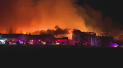 Large fire still burning at chicken farm in Brazos County