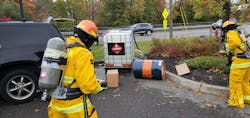 When a chemical spill occurs, the immediate goal is to contain the spill and confine it to a small area to prevent further dispersion.