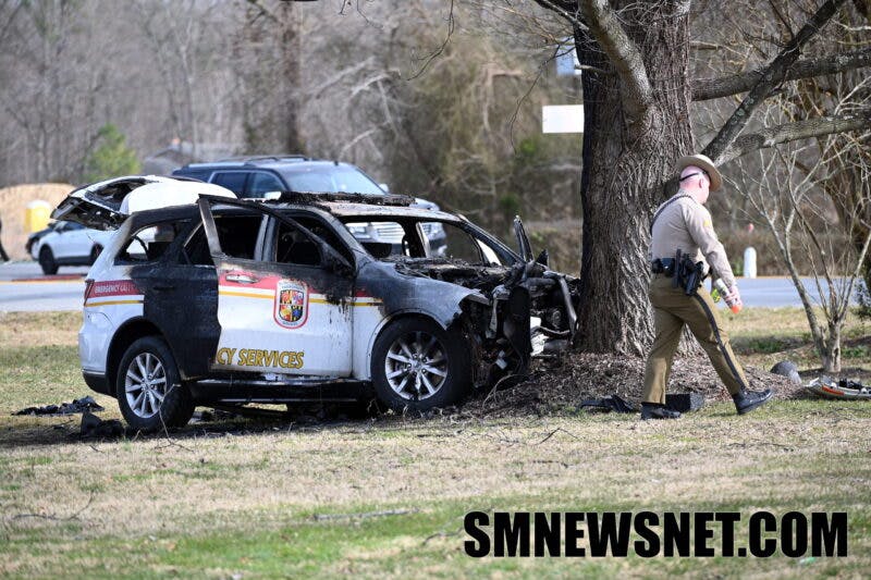 A state trooper rescued at least one of the EMS personnel from the vehicle.