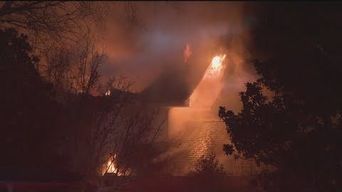 Crews battling house fire in DeKalb County