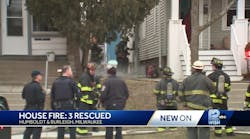 Milwaukee fire crews rescue three people trapped in house fire